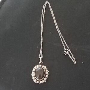 Silver Oval Pendant Necklace with Dark Stone